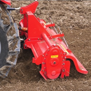 Tillage operation of tractor with rotavator attached